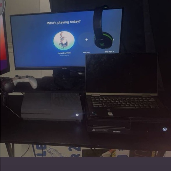 Black Xbox One Gaming Console and Acer Gaming monitor with headset and controllr